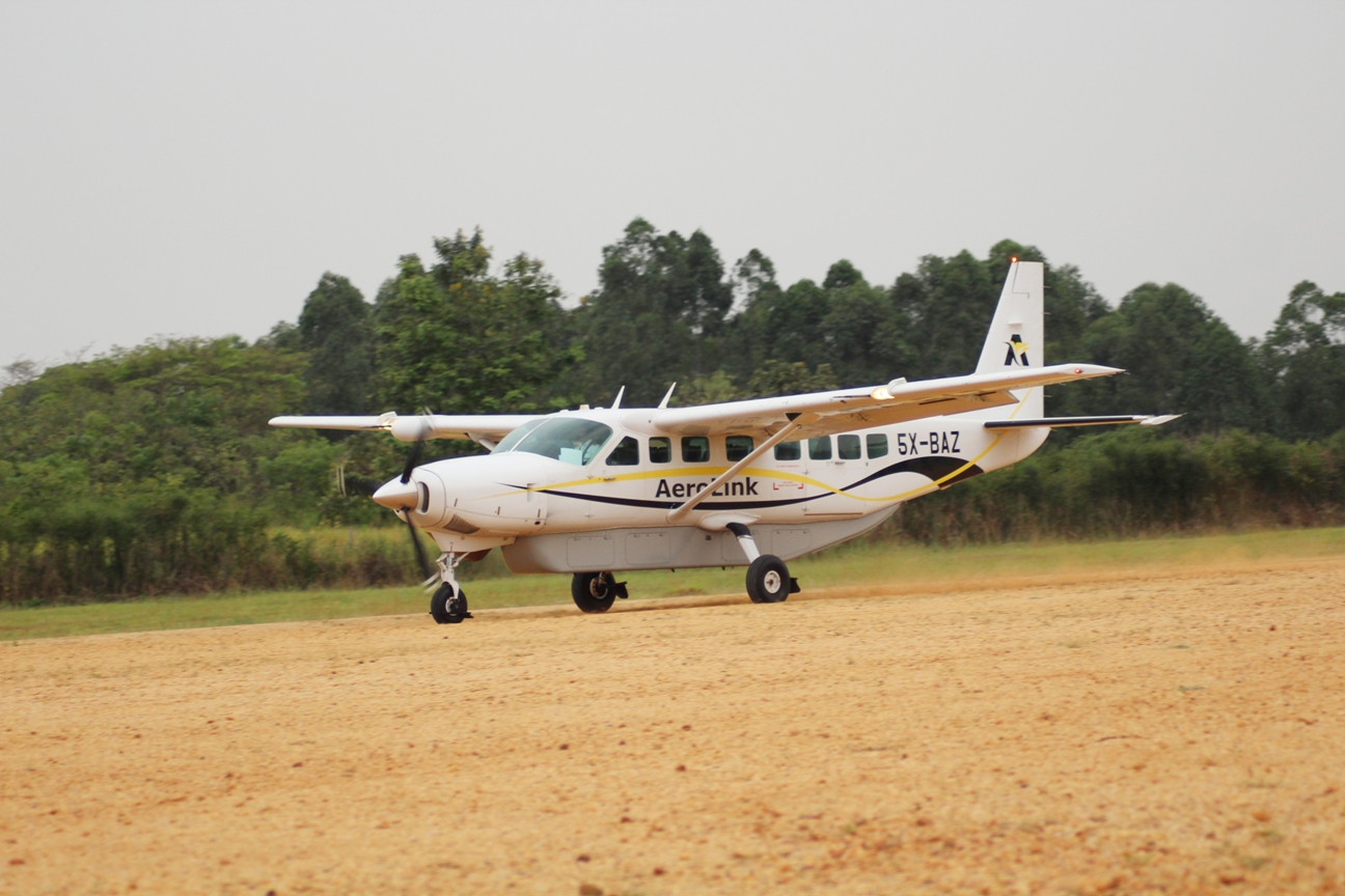 Aerolink Uganda aircraft landing at Kihihi Airstrip, the gateway to Bwindi Impenetrable National Park.